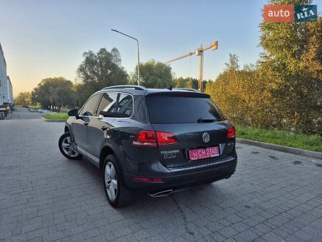 Серый Фольксваген Туарег, объемом двигателя 2.97 л и пробегом 248 тыс. км за 16500 $, фото 49 на Automoto.ua