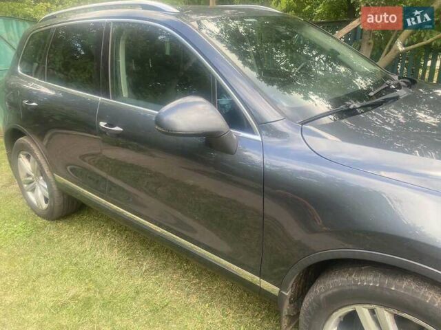 Сірий Фольксваген Туарег, об'ємом двигуна 2.97 л та пробігом 286 тис. км за 18700 $, фото 1 на Automoto.ua