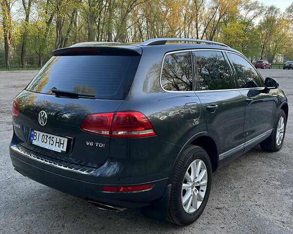 Сірий Фольксваген Туарег, об'ємом двигуна 2.97 л та пробігом 164 тис. км за 19899 $, фото 5 на Automoto.ua