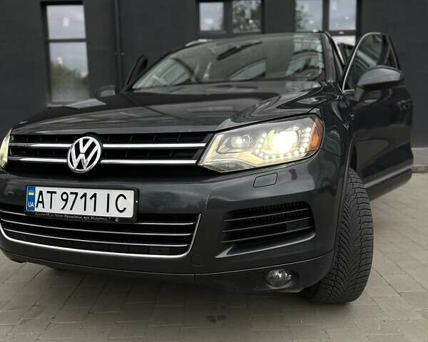 Серый Фольксваген Туарег, объемом двигателя 2.97 л и пробегом 210 тыс. км за 18500 $, фото 3 на Automoto.ua