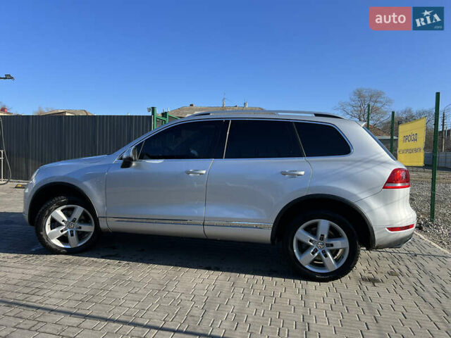 Серый Фольксваген Туарег, объемом двигателя 2.97 л и пробегом 252 тыс. км за 17550 $, фото 1 на Automoto.ua