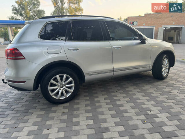 Серый Фольксваген Туарег, объемом двигателя 2.97 л и пробегом 340 тыс. км за 15900 $, фото 7 на Automoto.ua