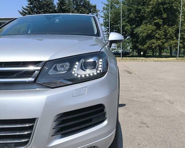 Серый Фольксваген Туарег, объемом двигателя 3 л и пробегом 280 тыс. км за 22500 $, фото 14 на Automoto.ua