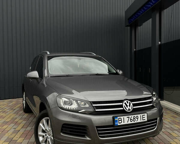 Серый Фольксваген Туарег, объемом двигателя 2.97 л и пробегом 360 тыс. км за 17500 $, фото 2 на Automoto.ua