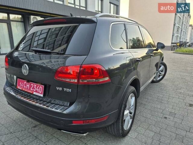 Серый Фольксваген Туарег, объемом двигателя 2.97 л и пробегом 248 тыс. км за 16500 $, фото 2 на Automoto.ua