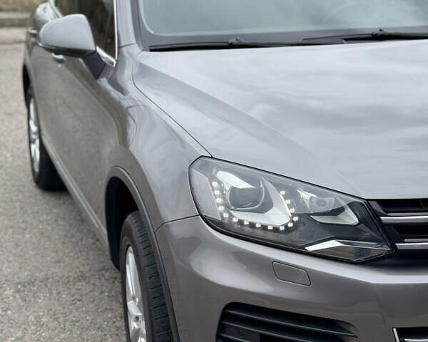 Серый Фольксваген Туарег, объемом двигателя 2.97 л и пробегом 360 тыс. км за 17500 $, фото 19 на Automoto.ua