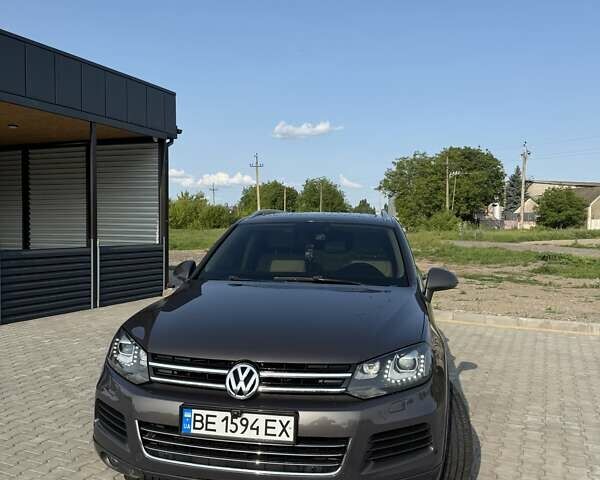 Серый Фольксваген Туарег, объемом двигателя 2.97 л и пробегом 174 тыс. км за 19000 $, фото 1 на Automoto.ua