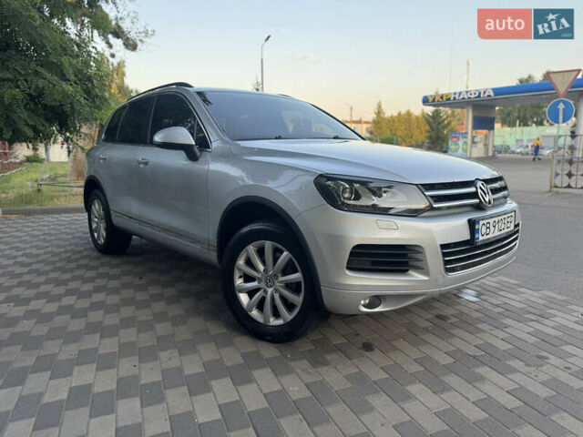 Серый Фольксваген Туарег, объемом двигателя 2.97 л и пробегом 340 тыс. км за 15900 $, фото 2 на Automoto.ua