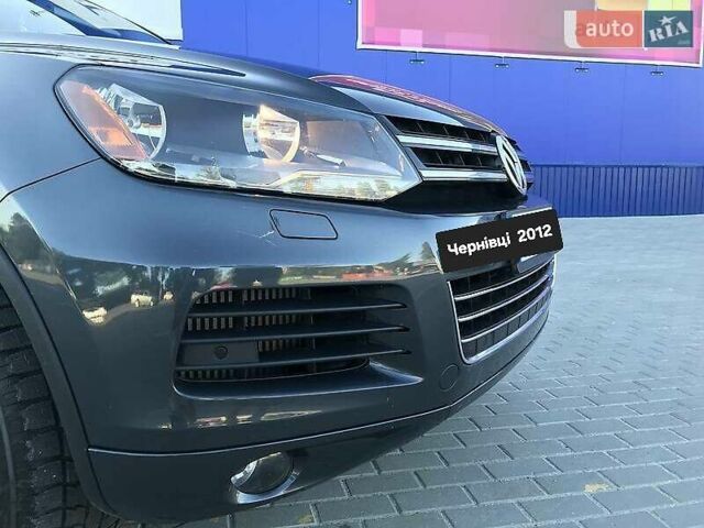 Серый Фольксваген Туарег, объемом двигателя 2.97 л и пробегом 177 тыс. км за 22000 $, фото 1 на Automoto.ua