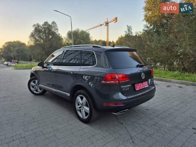 Серый Фольксваген Туарег, объемом двигателя 2.97 л и пробегом 248 тыс. км за 16500 $, фото 6 на Automoto.ua
