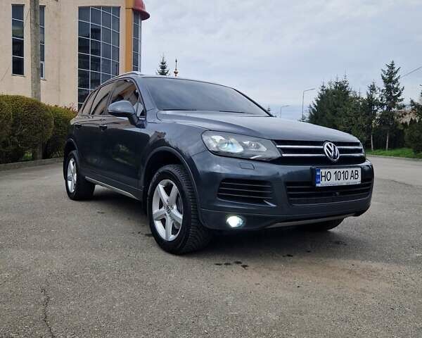 Сірий Фольксваген Туарег, об'ємом двигуна 3 л та пробігом 137 тис. км за 25900 $, фото 1 на Automoto.ua