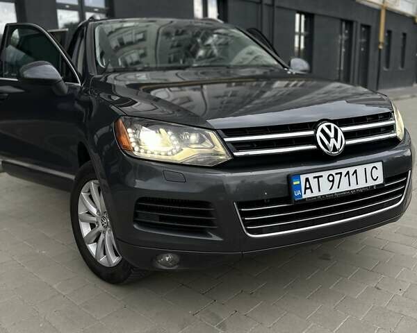 Серый Фольксваген Туарег, объемом двигателя 2.97 л и пробегом 210 тыс. км за 18500 $, фото 2 на Automoto.ua