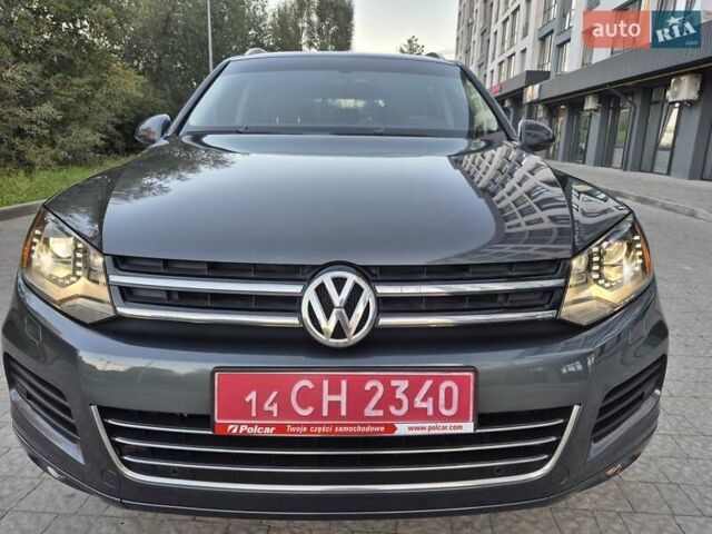 Серый Фольксваген Туарег, объемом двигателя 2.97 л и пробегом 248 тыс. км за 16500 $, фото 1 на Automoto.ua