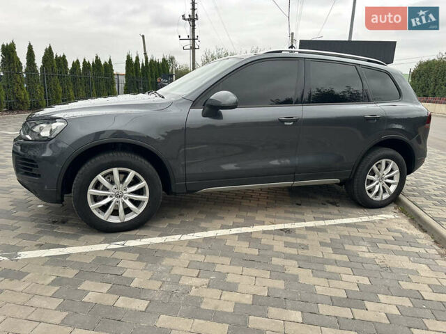 Серый Фольксваген Туарег, объемом двигателя 2.97 л и пробегом 297 тыс. км за 21500 $, фото 1 на Automoto.ua