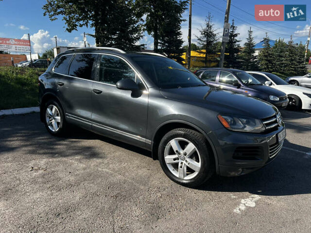 Сірий Фольксваген Туарег, об'ємом двигуна 3 л та пробігом 290 тис. км за 16300 $, фото 1 на Automoto.ua