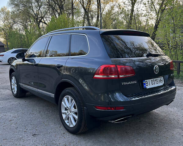 Сірий Фольксваген Туарег, об'ємом двигуна 2.97 л та пробігом 164 тис. км за 19899 $, фото 4 на Automoto.ua