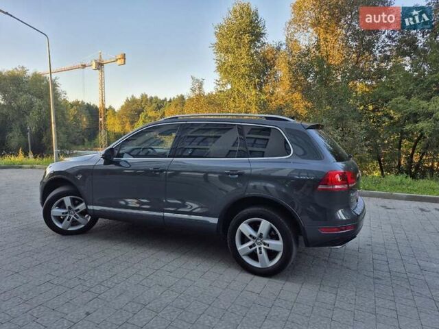 Серый Фольксваген Туарег, объемом двигателя 2.97 л и пробегом 248 тыс. км за 16500 $, фото 52 на Automoto.ua