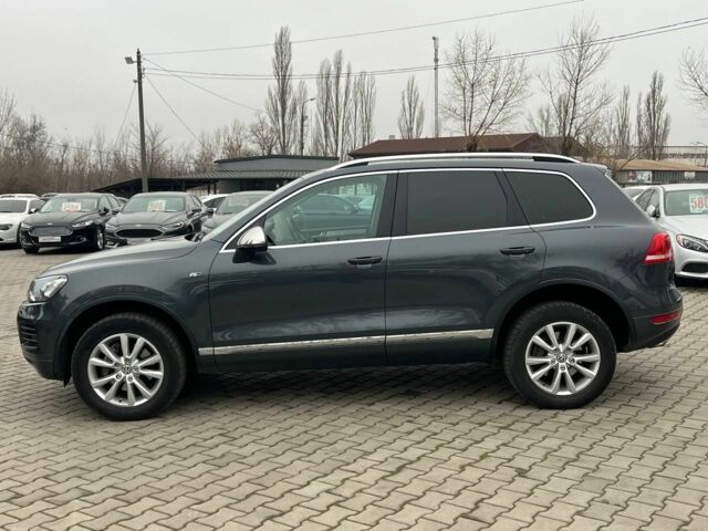 Серый Фольксваген Туарег, объемом двигателя 3 л и пробегом 223 тыс. км за 19500 $, фото 3 на Automoto.ua