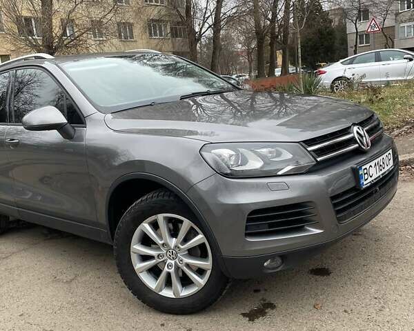 Сірий Фольксваген Туарег, об'ємом двигуна 3 л та пробігом 210 тис. км за 20700 $, фото 2 на Automoto.ua