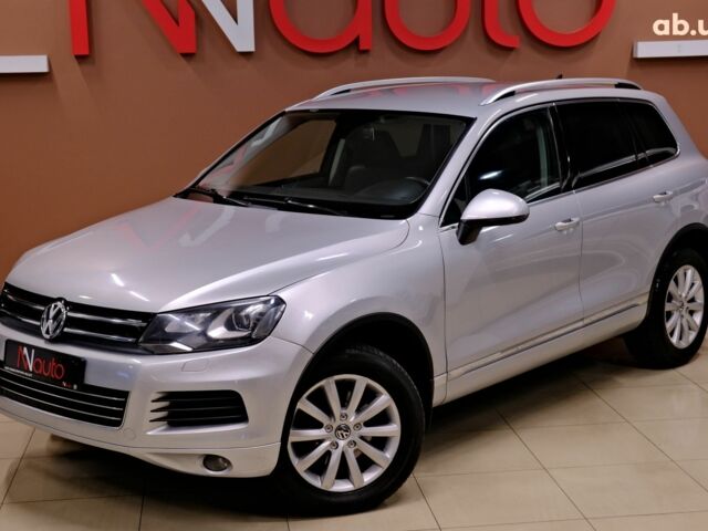 Серый Фольксваген Туарег, объемом двигателя 3 л и пробегом 219 тыс. км за 17900 $, фото 1 на Automoto.ua