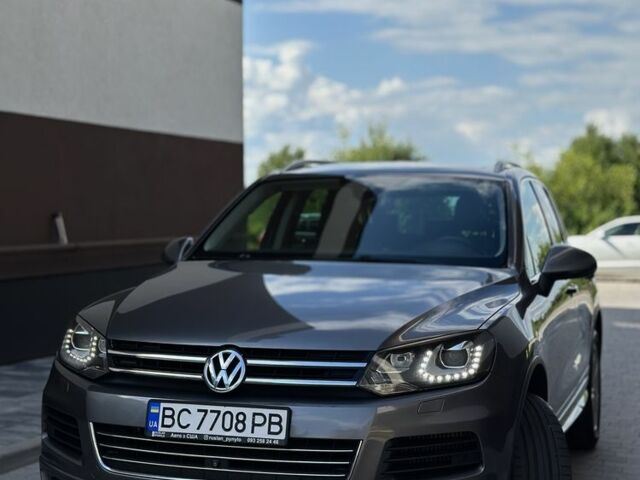 Серый Фольксваген Туарег, объемом двигателя 3 л и пробегом 262 тыс. км за 22000 $, фото 2 на Automoto.ua