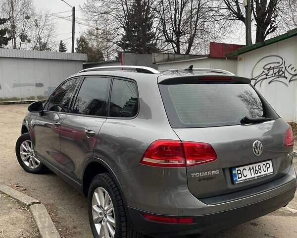 Сірий Фольксваген Туарег, об'ємом двигуна 3 л та пробігом 210 тис. км за 20700 $, фото 1 на Automoto.ua