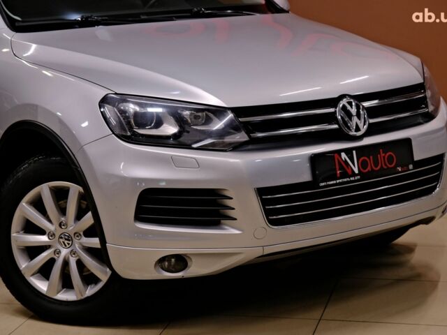 Серый Фольксваген Туарег, объемом двигателя 3 л и пробегом 219 тыс. км за 17900 $, фото 2 на Automoto.ua