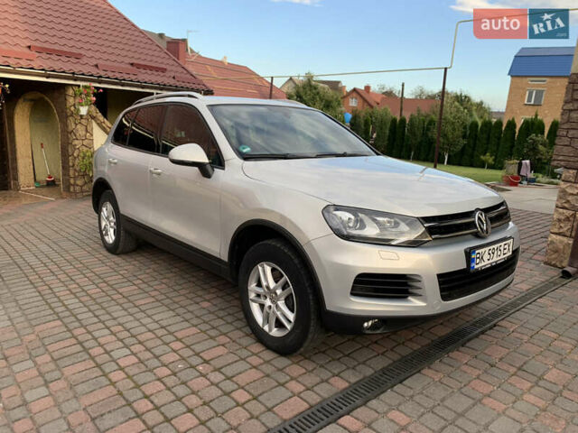 Серый Фольксваген Туарег, объемом двигателя 2.97 л и пробегом 300 тыс. км за 17200 $, фото 1 на Automoto.ua