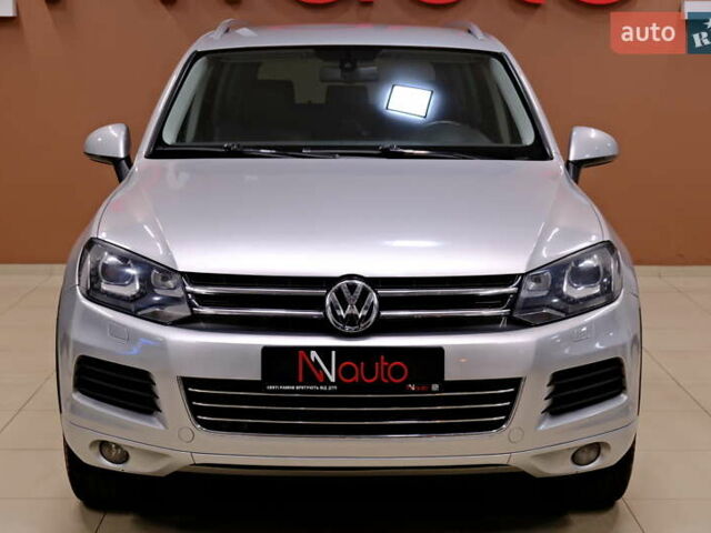 Серый Фольксваген Туарег, объемом двигателя 3 л и пробегом 219 тыс. км за 17900 $, фото 1 на Automoto.ua