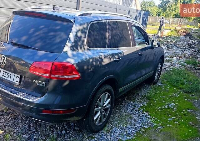 Серый Фольксваген Туарег, объемом двигателя 3 л и пробегом 319 тыс. км за 17500 $, фото 5 на Automoto.ua