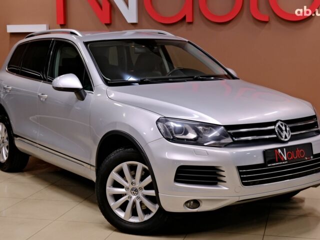 Серый Фольксваген Туарег, объемом двигателя 3 л и пробегом 219 тыс. км за 17900 $, фото 3 на Automoto.ua