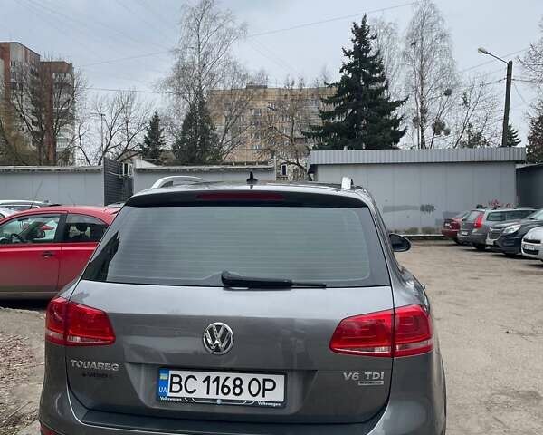 Сірий Фольксваген Туарег, об'ємом двигуна 3 л та пробігом 210 тис. км за 20700 $, фото 3 на Automoto.ua