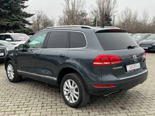 Серый Фольксваген Туарег, объемом двигателя 3 л и пробегом 223 тыс. км за 19500 $, фото 4 на Automoto.ua