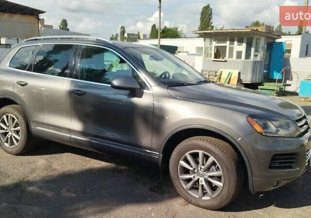 Серый Фольксваген Туарег, объемом двигателя 3.6 л и пробегом 54 тыс. км за 21000 $, фото 1 на Automoto.ua