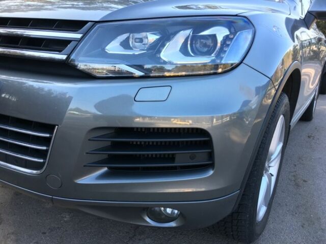 Серый Фольксваген Туарег, объемом двигателя 3 л и пробегом 80 тыс. км за 29264 $, фото 1 на Automoto.ua