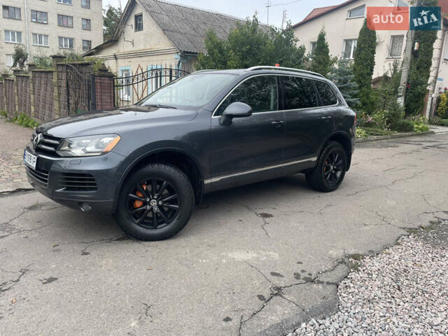 Серый Фольксваген Туарег, объемом двигателя 3 л и пробегом 278 тыс. км за 17500 $, фото 2 на Automoto.ua