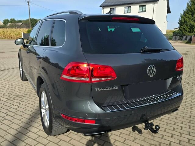 Сірий Фольксваген Туарег, об'ємом двигуна 3 л та пробігом 87 тис. км за 8500 $, фото 5 на Automoto.ua