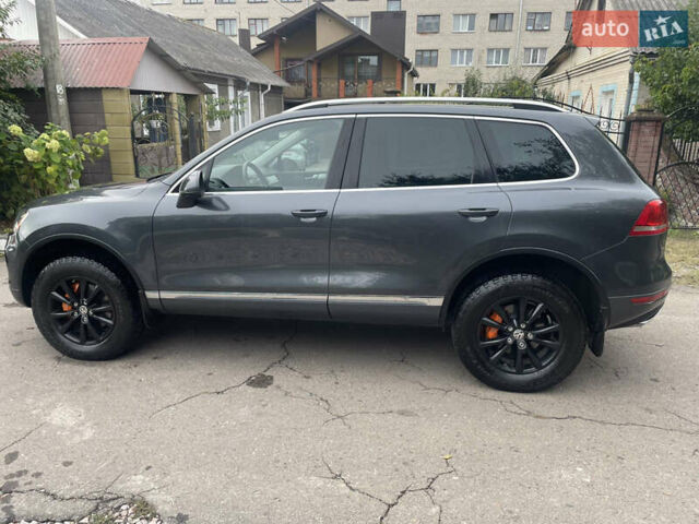 Серый Фольксваген Туарег, объемом двигателя 3 л и пробегом 278 тыс. км за 17500 $, фото 4 на Automoto.ua