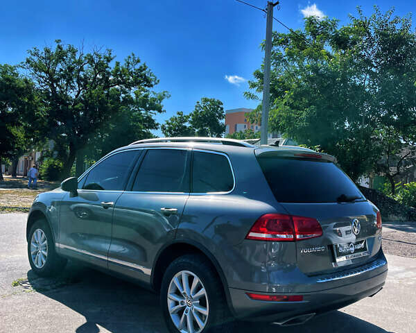 Сірий Фольксваген Туарег, об'ємом двигуна 3 л та пробігом 225 тис. км за 18500 $, фото 5 на Automoto.ua