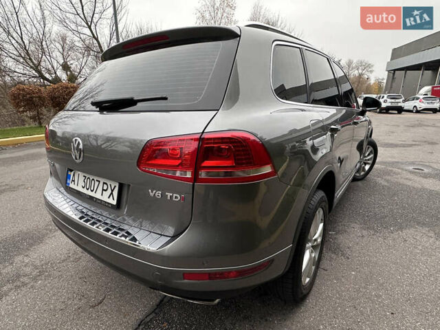 Сірий Фольксваген Туарег, об'ємом двигуна 3 л та пробігом 210 тис. км за 20800 $, фото 1 на Automoto.ua