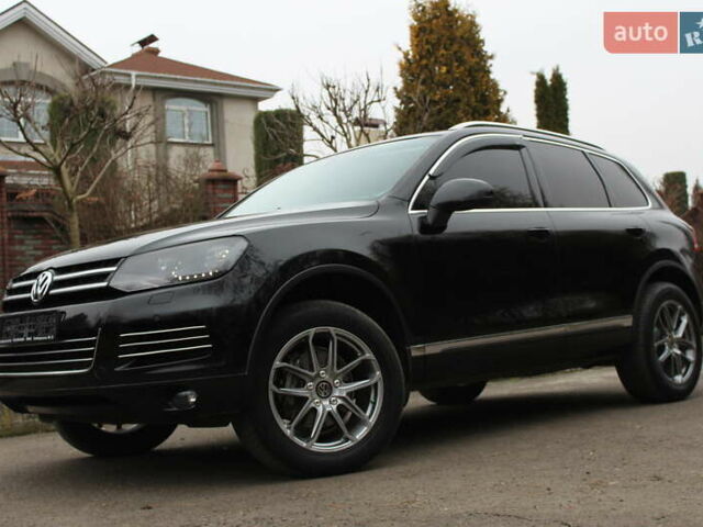 Серый Фольксваген Туарег, объемом двигателя 2.97 л и пробегом 183 тыс. км за 19900 $, фото 1 на Automoto.ua