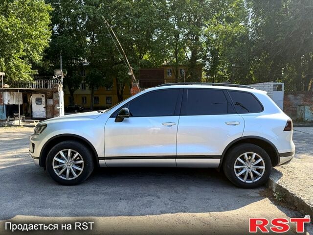 Серый Фольксваген Туарег, объемом двигателя 3.6 л и пробегом 169 тыс. км за 22000 $, фото 1 на Automoto.ua