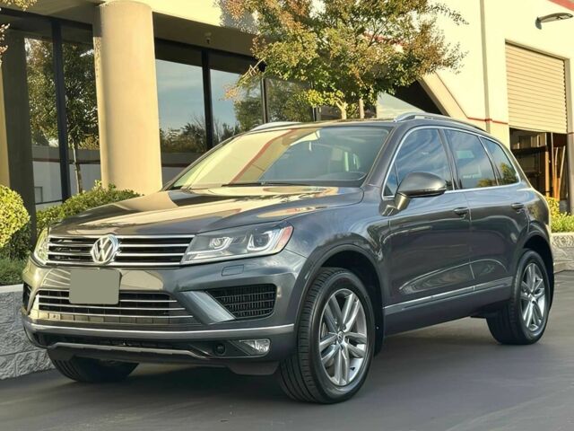 Сірий Фольксваген Туарег, об'ємом двигуна 3 л та пробігом 71 тис. км за 10000 $, фото 1 на Automoto.ua