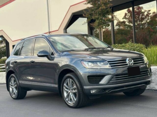 Серый Фольксваген Туарег, объемом двигателя 3 л и пробегом 72 тыс. км за 13600 $, фото 1 на Automoto.ua