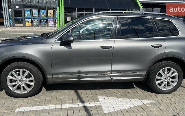 Серый Фольксваген Туарег, объемом двигателя 3 л и пробегом 173 тыс. км за 32000 $, фото 8 на Automoto.ua