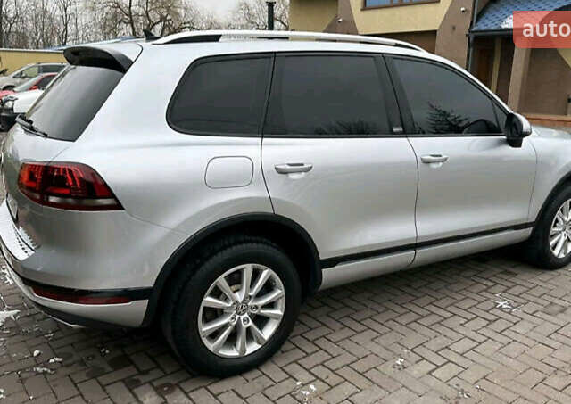 Серый Фольксваген Туарег, объемом двигателя 2.97 л и пробегом 268 тыс. км за 24439 $, фото 1 на Automoto.ua