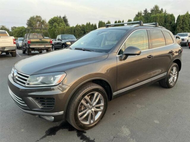 Серый Фольксваген Туарег, объемом двигателя 3 л и пробегом 77 тыс. км за 13600 $, фото 2 на Automoto.ua