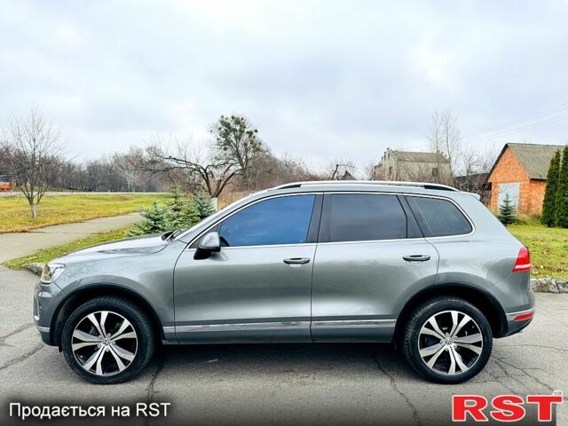 Серый Фольксваген Туарег, объемом двигателя 3 л и пробегом 109 тыс. км за 31500 $, фото 1 на Automoto.ua