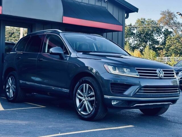 Серый Фольксваген Туарег, объемом двигателя 3 л и пробегом 80 тыс. км за 10200 $, фото 2 на Automoto.ua