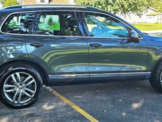 Сірий Фольксваген Туарег, об'ємом двигуна 3 л та пробігом 72 тис. км за 13600 $, фото 4 на Automoto.ua